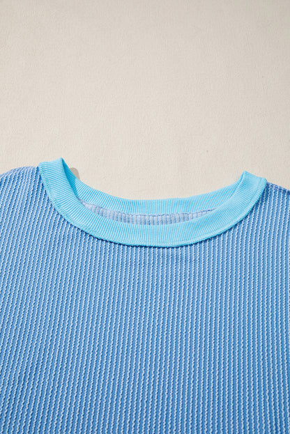 Myosotis Twisted Rib Uneven Hem Drop Shoulder Loose Knit Top